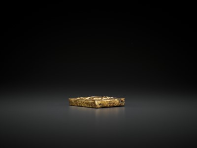 Lot 510 - A GILT BRONZE AND WHITE JADE ‘DRAGON’ BELT PLAQUE, TANG DYNASTY