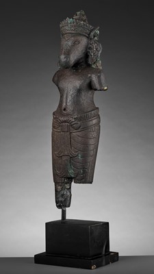 Lot 708 - A BLACK STONE FIGURE OF VAJIMUKHA, ANGKOR PERIOD, KOH KER STYLE