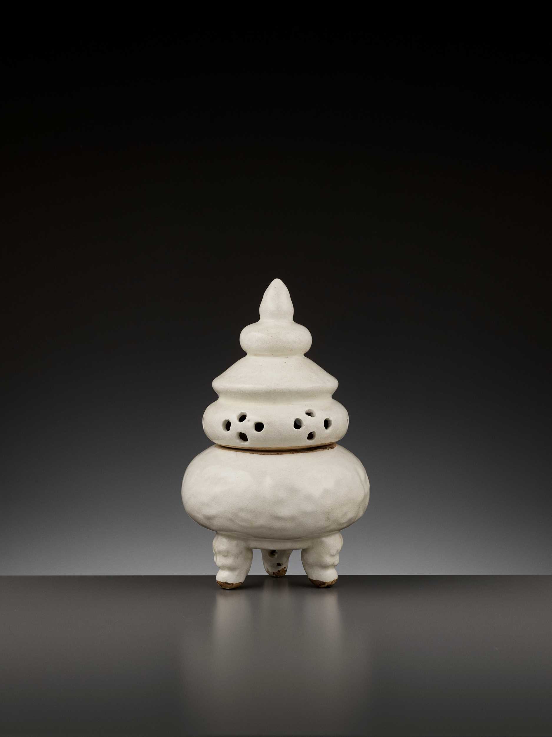 Lot 181 - A RARE WHITE-GLAZED ANHUA-DECORATED INCENSE BURNER AND COVER, LATE SONG TO EARLY MING