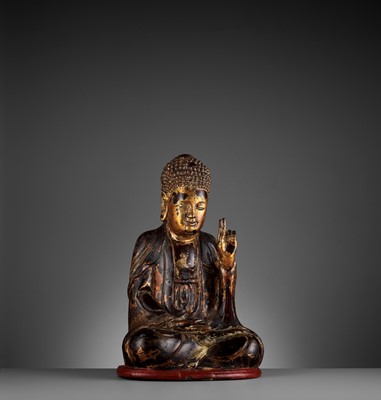 Lot 778 - A VIETNAMESE GILT-LACQUERED WOOD STATUE OF BUDDHA