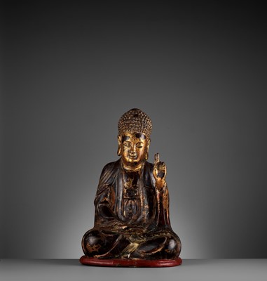 Lot 778 - A VIETNAMESE GILT-LACQUERED WOOD STATUE OF BUDDHA