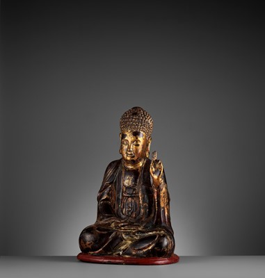 Lot 778 - A VIETNAMESE GILT-LACQUERED WOOD STATUE OF BUDDHA