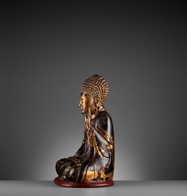 Lot 778 - A VIETNAMESE GILT-LACQUERED WOOD STATUE OF BUDDHA