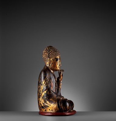 Lot 778 - A VIETNAMESE GILT-LACQUERED WOOD STATUE OF BUDDHA