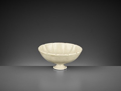 Lot 167 - A DINGYAO ‘LOTUS’ STEM CUP, NORTHERN SONG DYNASTY