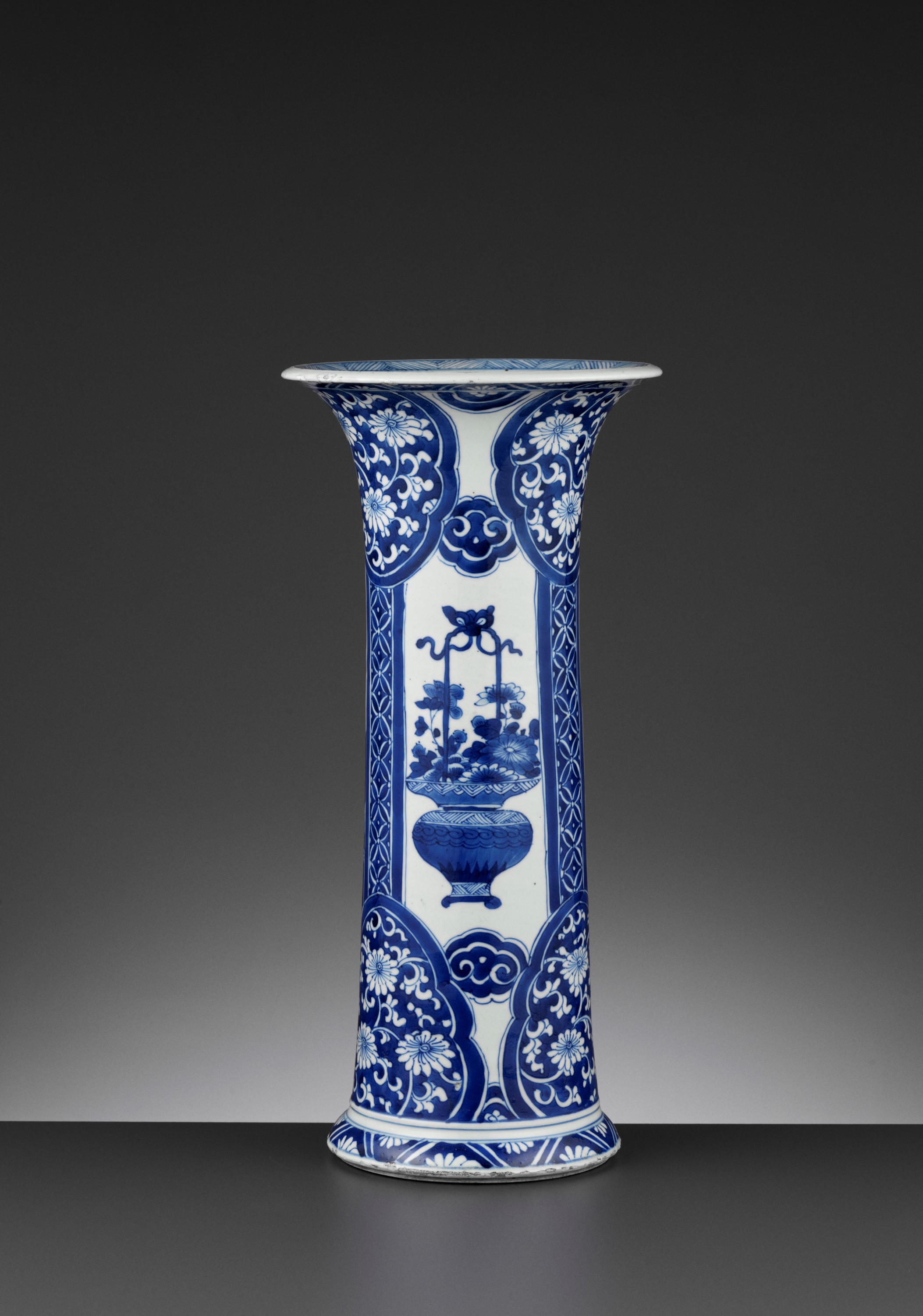 Lot 261 A BLUE AND WHITE ‘FLORAL’ BEAKER VASE,