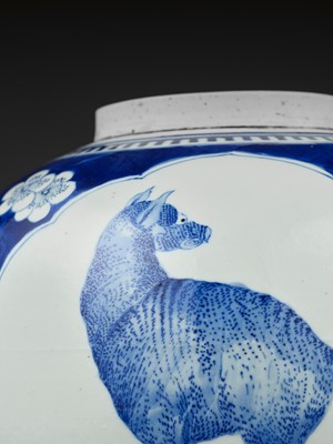 Lot 265 - A BLUE AND WHITE ‘DOG AND DEER’ GINGER JAR, KANGXI