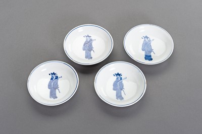 Lot 344 - NINE BLUE AND WHITE PORCELAIN ‘MING COURT OFFICIAL’ DISHES, KANGXI PERIOD