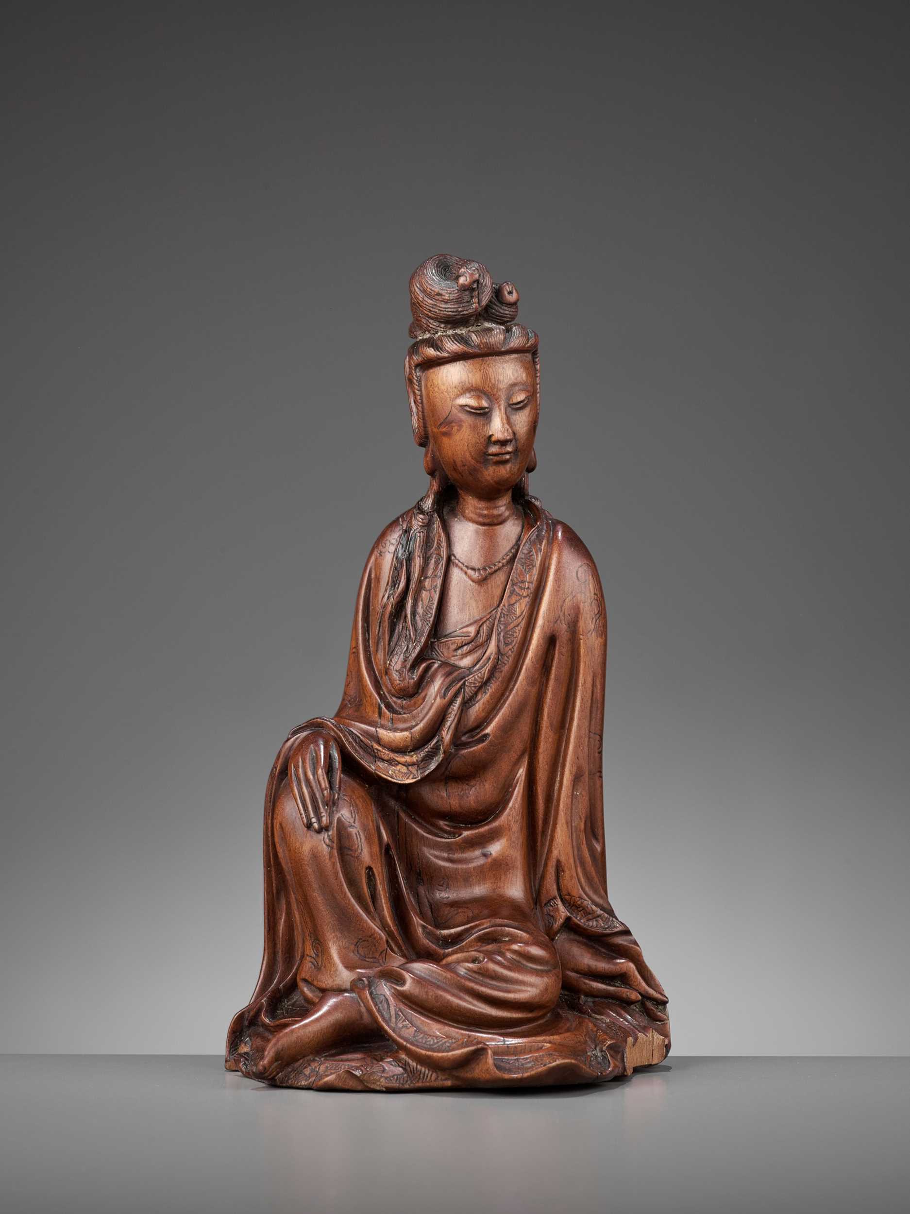 Lot 551 - A BOXWOOD FIGURE OF GUANYIN, 18TH CENTURY