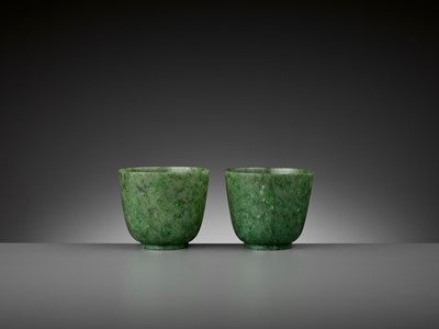 Lot 163 - A PAIR OF SPINACH-GREEN JADE CUPS, QING DYNASTY