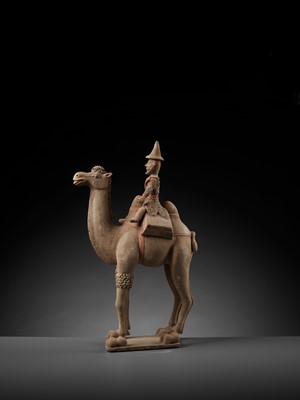 Lot 137 - A LARGE PAINTED POTTERY BACTRIAN CAMEL WITH RIDER, TANG DYNASTY