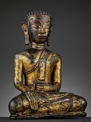 Lot 730 - A HEAVILY CAST, GILT-LACQUERED BRONZE OF BUDDHA, 17TH-18TH CENTURY