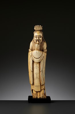 Lot 570 - A LARGE IVORY FIGURE OF AN IMMORTAL, LATE MING DYNASTY