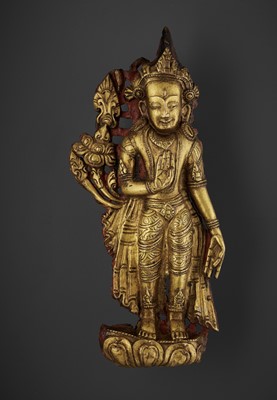 Lot 454 - A GILT COPPER REPOUSSÉ PANEL OF MAITREYA, 14TH-16TH CENTURY