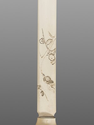Lot 142 - A FINE IVORY PAGE TURNER WITH A MONKEY AND WASP NEST