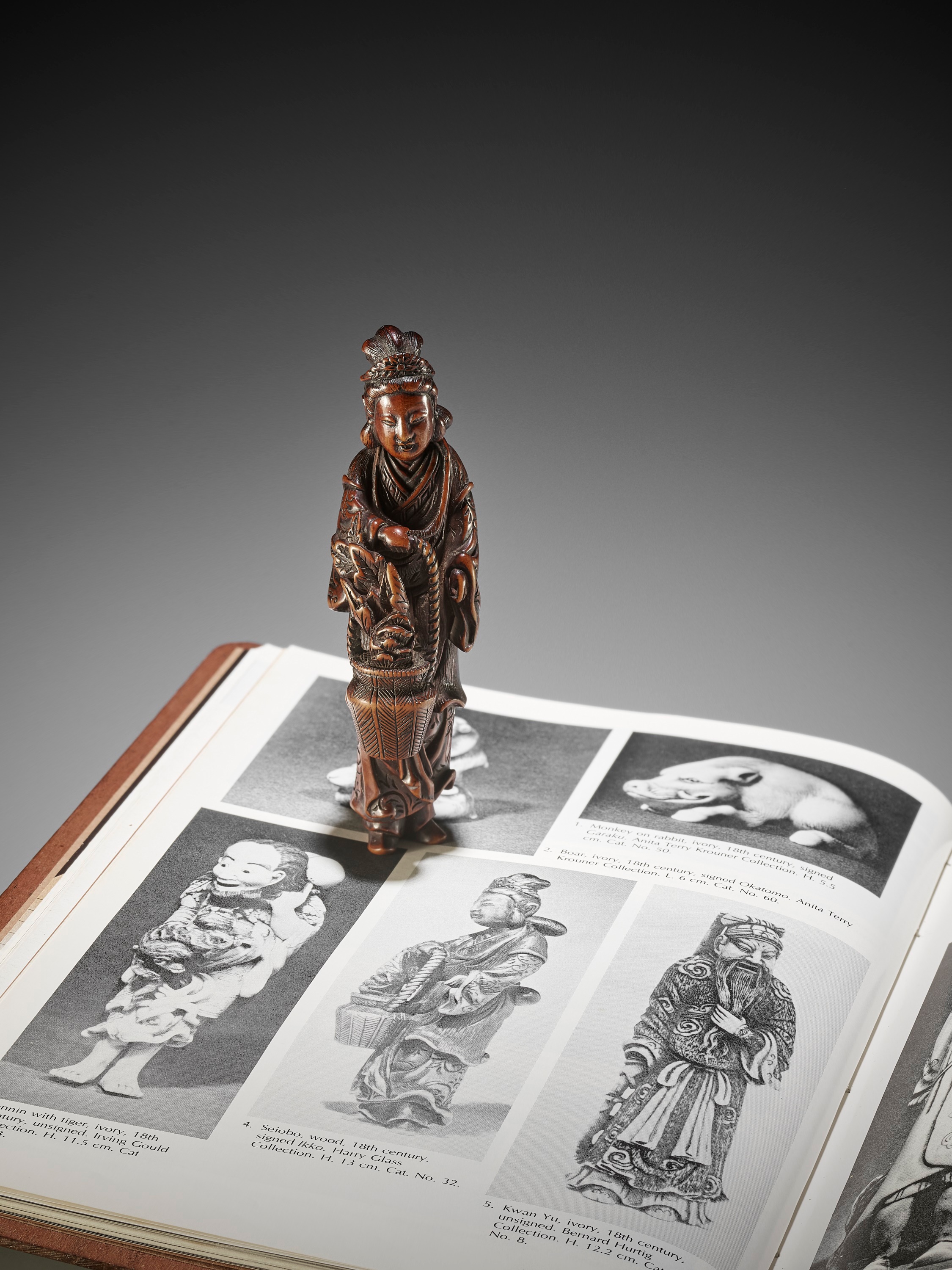 Lot 173 - HASEGAWA IKKO: A TALL AND FINE WOOD NETSUKE