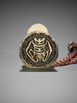 Lot 262 - A STAG ANTLER INGYO NETSUKE OF A SHISHI WITH STAG ANTLER OJIME