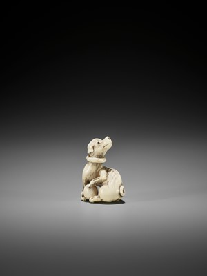 Lot 60 - AN IVORY NETSUKE OF A DOG WITH BALL, ATTRIBUTED TO MITSUHARU