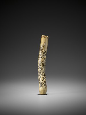 Lot 439 - A FINE STAG ANTLER KISERUZUTSU WITH SHISHI ON A ROCK AMONGST PEONIES