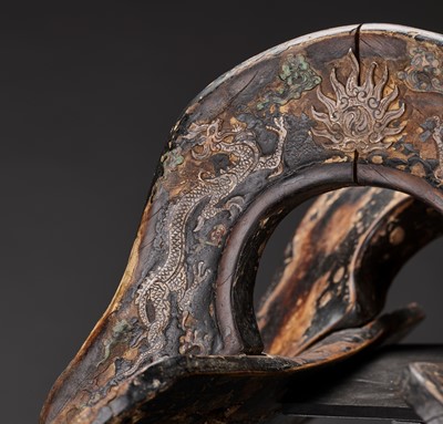 Lot 138 - A RARE LIAO DYNASTY LACQUERED WOOD SADDLE WITH GILT COPPER APPLICATIONS