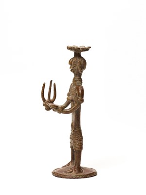 A BASTAR BRONZE OF A FEMALE DEITY WITH TRIDENT AND KHAPPAR