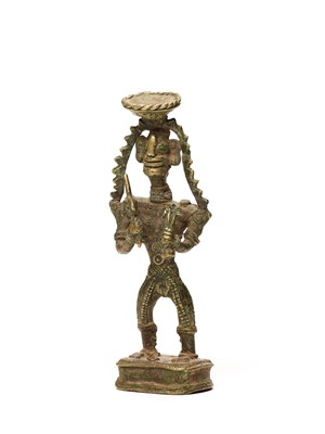A BASTAR BRONZE OF A FEMALE DEITY WITH TRIDENT AND SCEPTRE