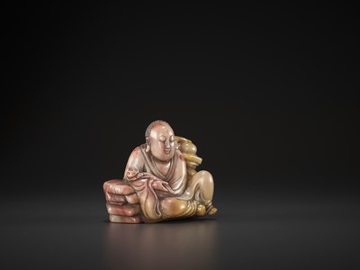 Lot 769 - A SOAPSTONE FIGURE OF A LUOHAN, QING