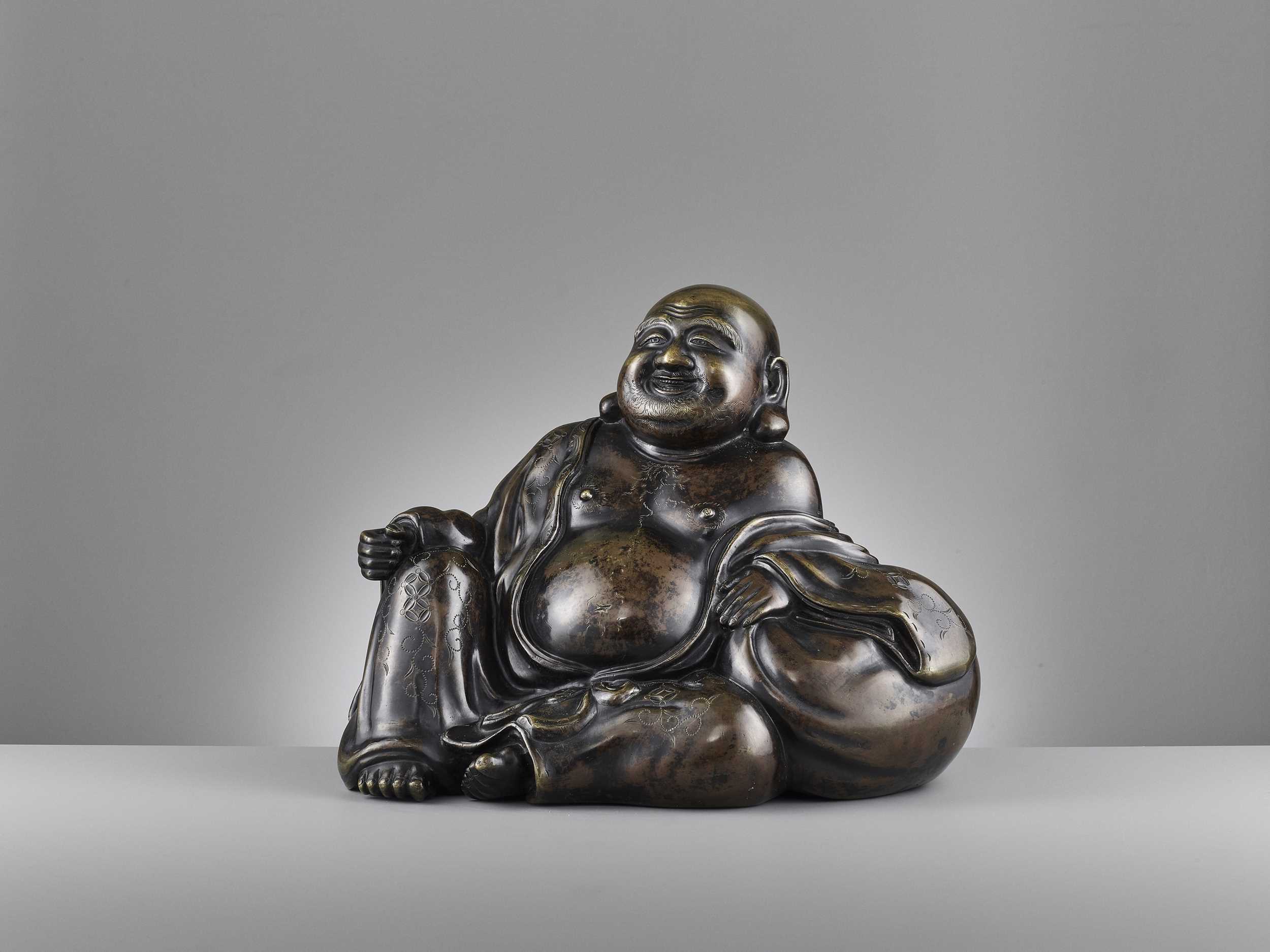 Lot 586 - A LARGE AND HEAVILY CAST BRONZE FIGURE OF BUDAI, QING DYNASTY
