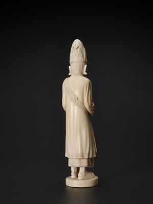 Lot 657 - A 19TH CENTURY INDO-PERSIAN IVORY SCULPTURE OF A PRIEST