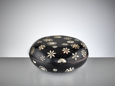 Lot 873 - A MOTHER-OF-PEARL-INLAID BLACK LACQUER BOX AND COVER