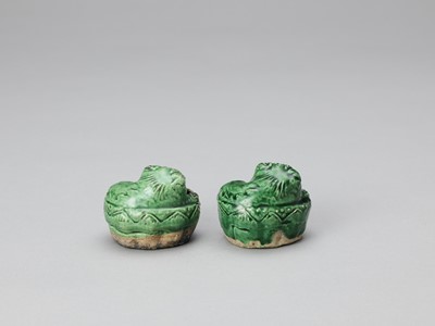 Lot 635 - A PAIR OF EMERALD GREEN GLAZED POTTERY BUDDHIST LION WATER DROPPERS, KANGXI