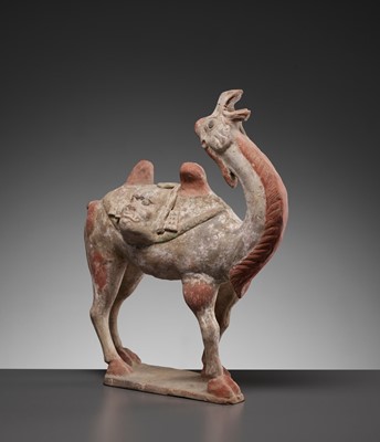 Lot 695 - A PAINTED POTTERY FIGURE OF A BACTRIAN CAMEL, TANG DYNASTY