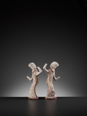 Lot 125 - A PAIR OF PAINTED POTTERY FIGURES OF DANCERS, HAN DYNASTY