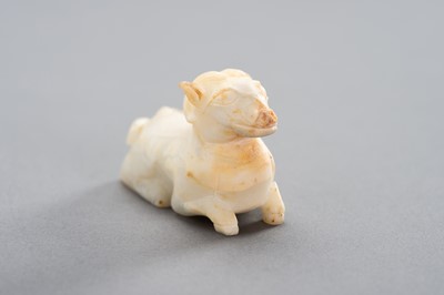 A WHITE JADE MINIATURE CARVING OF A RAM