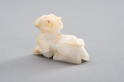 A WHITE JADE MINIATURE CARVING OF A RAM