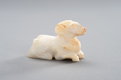 Lot 136 - A WHITE JADE MINIATURE CARVING OF A RAM