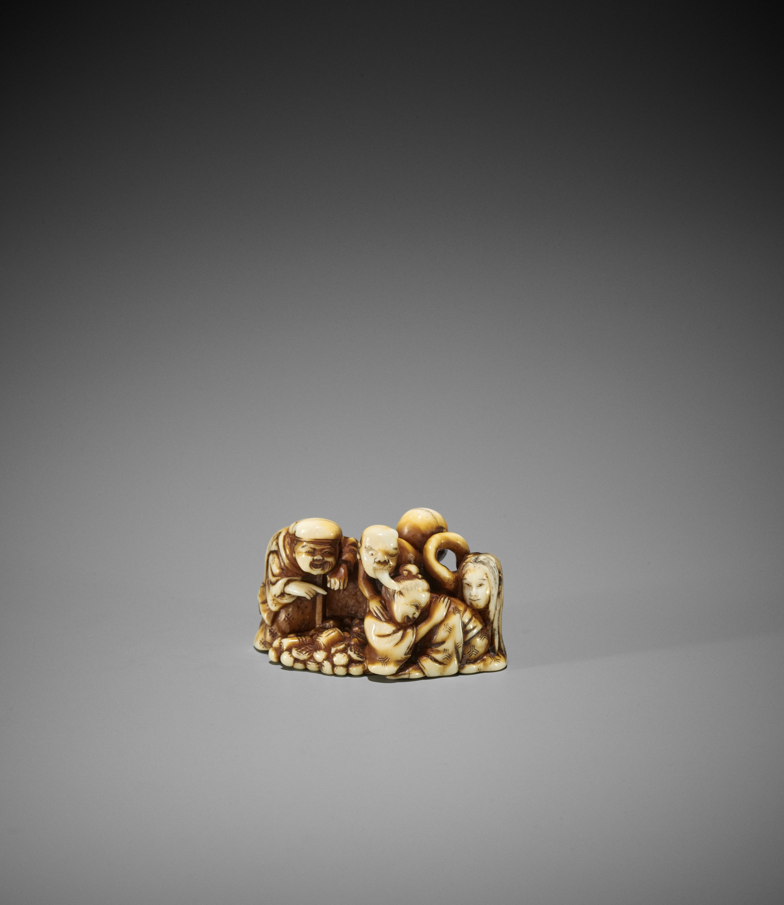 Lot 194 - GYOKUZAN: A RARE IVORY NETSUKE OF THE LEGEND