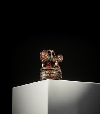 Lot 397 - A WOOD NETSUKE OF SHOKI CAPTURING ONI