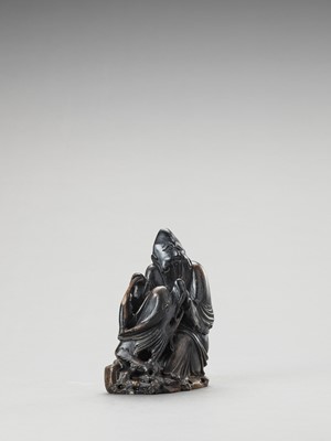 Lot 764 - A LARGE SOAPSTONE CARVING DEPICTING SHOULAO WITH DRAGON, LATE QING