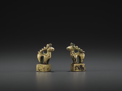 Lot 509 - A PAIR OF GILT BRONZE ‘STAG’ SEALS, EASTERN HAN