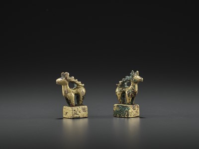 Lot 509 - A PAIR OF GILT BRONZE ‘STAG’ SEALS, EASTERN HAN
