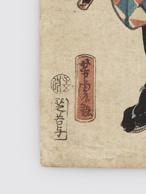Lot 487 - A JAPANESE COLOR WOODBLOCK PRINT OF A SAMURAI CLEANING HIS SWORD