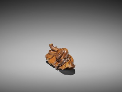 Lot 445 - SEIYODO TOMIHARU: A RARE WOOD NETSUKE OF A SNAIL ON A TARO LEAF