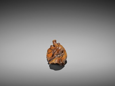 Lot 445 - SEIYODO TOMIHARU: A RARE WOOD NETSUKE OF A SNAIL ON A TARO LEAF