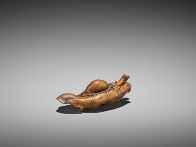 Lot 445 - SEIYODO TOMIHARU: A RARE WOOD NETSUKE OF A SNAIL ON A TARO LEAF