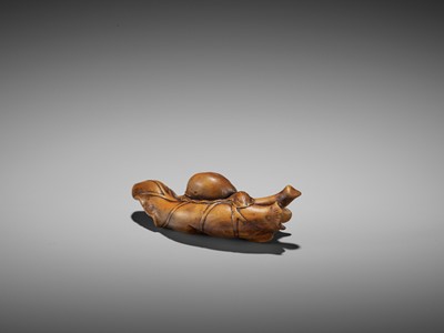 Lot 445 - SEIYODO TOMIHARU: A RARE WOOD NETSUKE OF A SNAIL ON A TARO LEAF