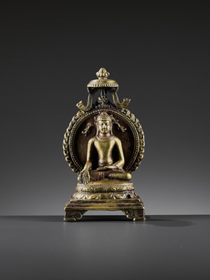 Lot 982 - AN INDIAN BRONZE FIGURE OF RATNASAMBHAVA, PALA PERIOD STYLE