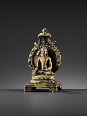 Lot 982 - AN INDIAN BRONZE FIGURE OF RATNASAMBHAVA, PALA PERIOD STYLE