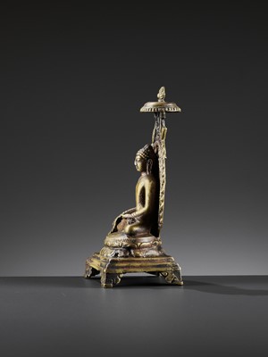 Lot 982 - AN INDIAN BRONZE FIGURE OF RATNASAMBHAVA, PALA PERIOD STYLE