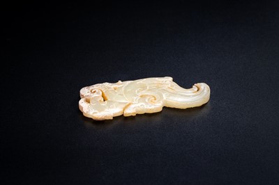 Lot 130 - A PALE GREEN JADE CARVING WITH DRAGON AND PHOENIX, BEISHANTOU TYPE, WESTERN HAN